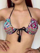 Load image into Gallery viewer, Colorful hand-beaded ruched bikini top with tassel detail and adjustable ties, showcasing unique Brazilian fabric patterns.
