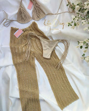 Load image into Gallery viewer, Luxury crochet trousers and matching bikini set in beige, perfect for a stylish beach cover-up.