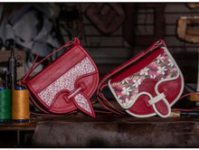 Load image into Gallery viewer, Handmade Rubi leather Carriel bags with colorful Mola appliqué, showcasing exquisite craftsmanship and cultural heritage.