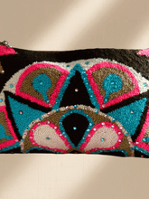 Load image into Gallery viewer, Embellished Wayuu terry cloth clutch featuring colorful, intricate patterns and luxurious, soft texture.